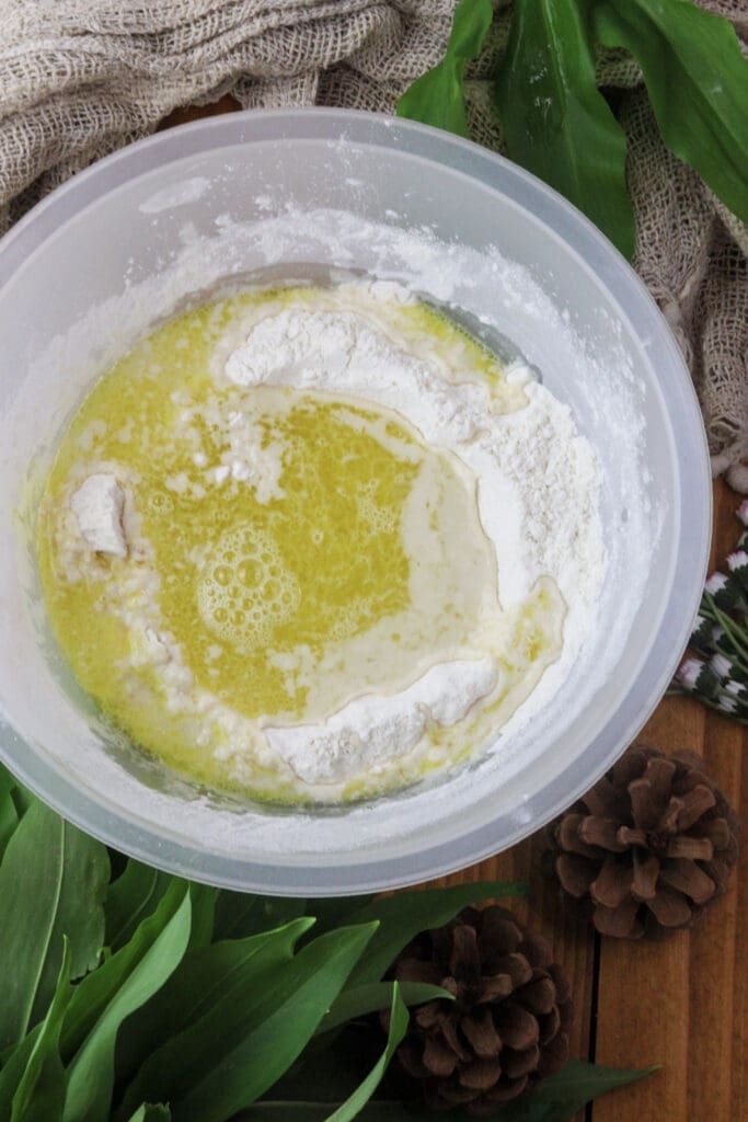 image of how to mix the ingedients for pizza dough